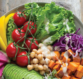 large bowl filled with bright colored vegetables